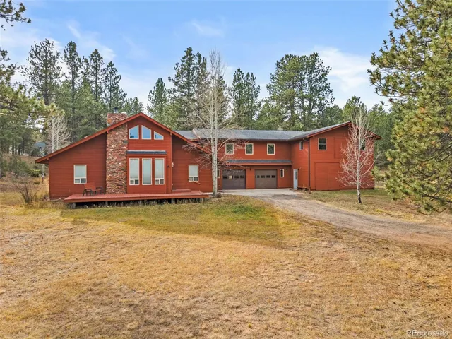 a view of a house with a swimming pool