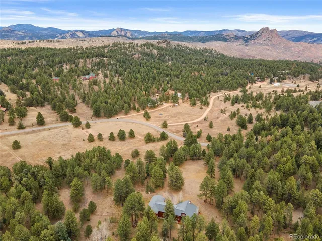 a view of a lake with mountains in the background