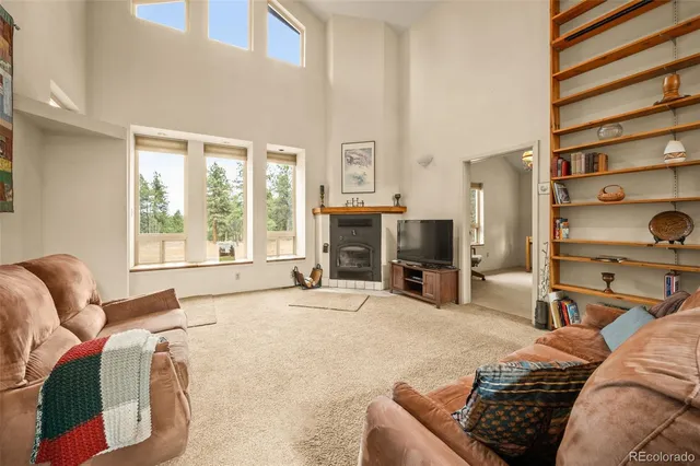 a bedroom with a bed and a fireplace