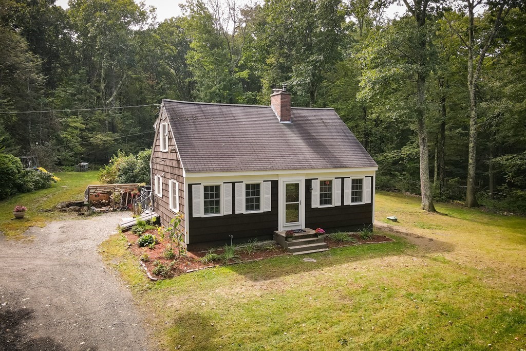 301 Main Road Montgomery, MA 01085 - Photo 1 of 41 a view of a house with pool and next to yard