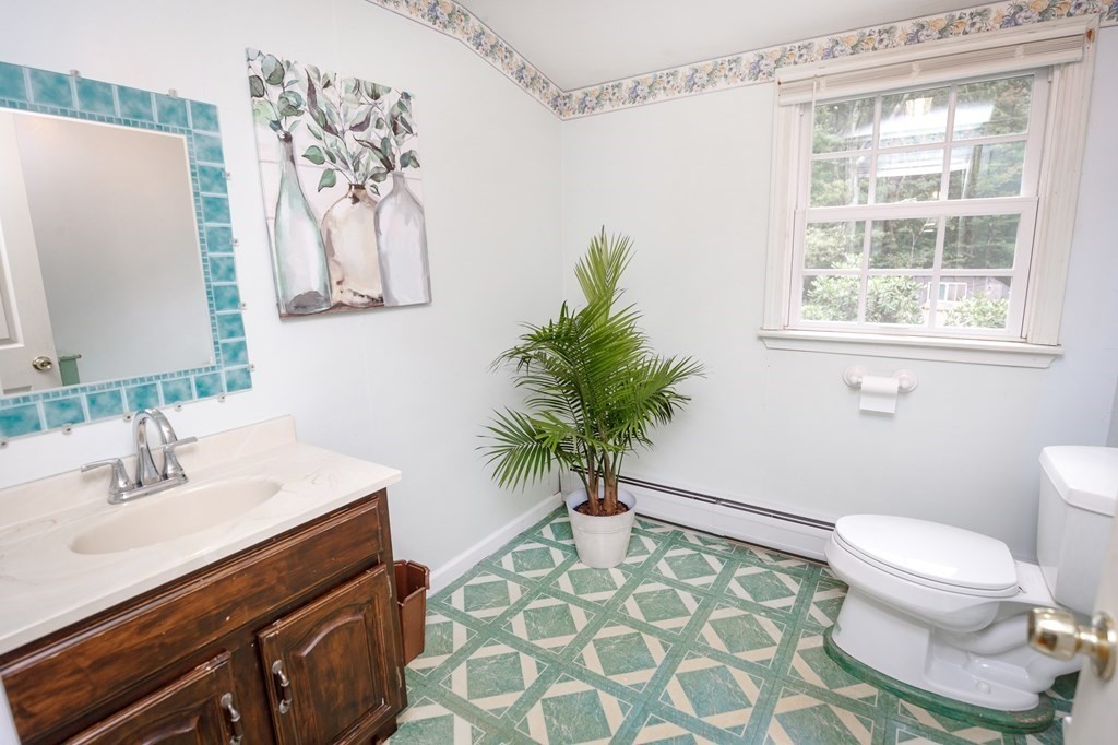 301 Main Road Montgomery, MA 01085 - Photo 23 of 41 a bathroom with a sink toilet and a mirror