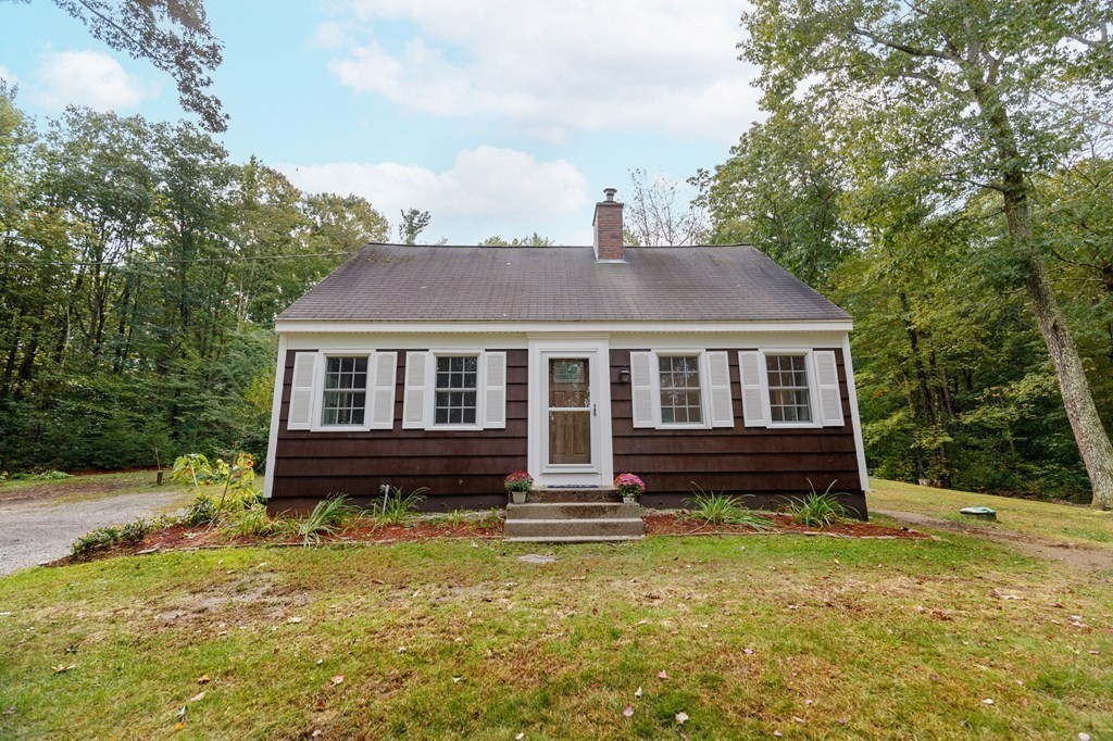 301 Main Road Montgomery, MA 01085 - Photo 40 of 41 a front view of a house with a yard