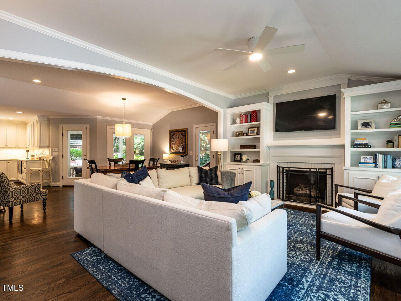 900 Davidson Street Raleigh, NC 27609 - Photo 3 of 36 a living room with furniture fireplace and flat screen tv