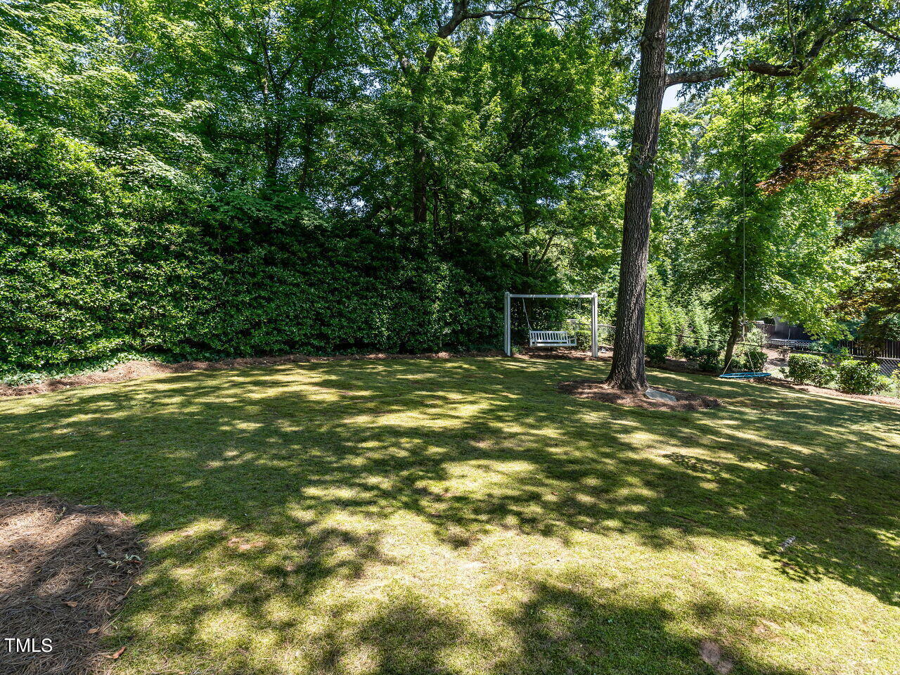 900 Davidson Street Raleigh, NC 27609 - Photo 34 of 36 a swimming pool with trees in the background