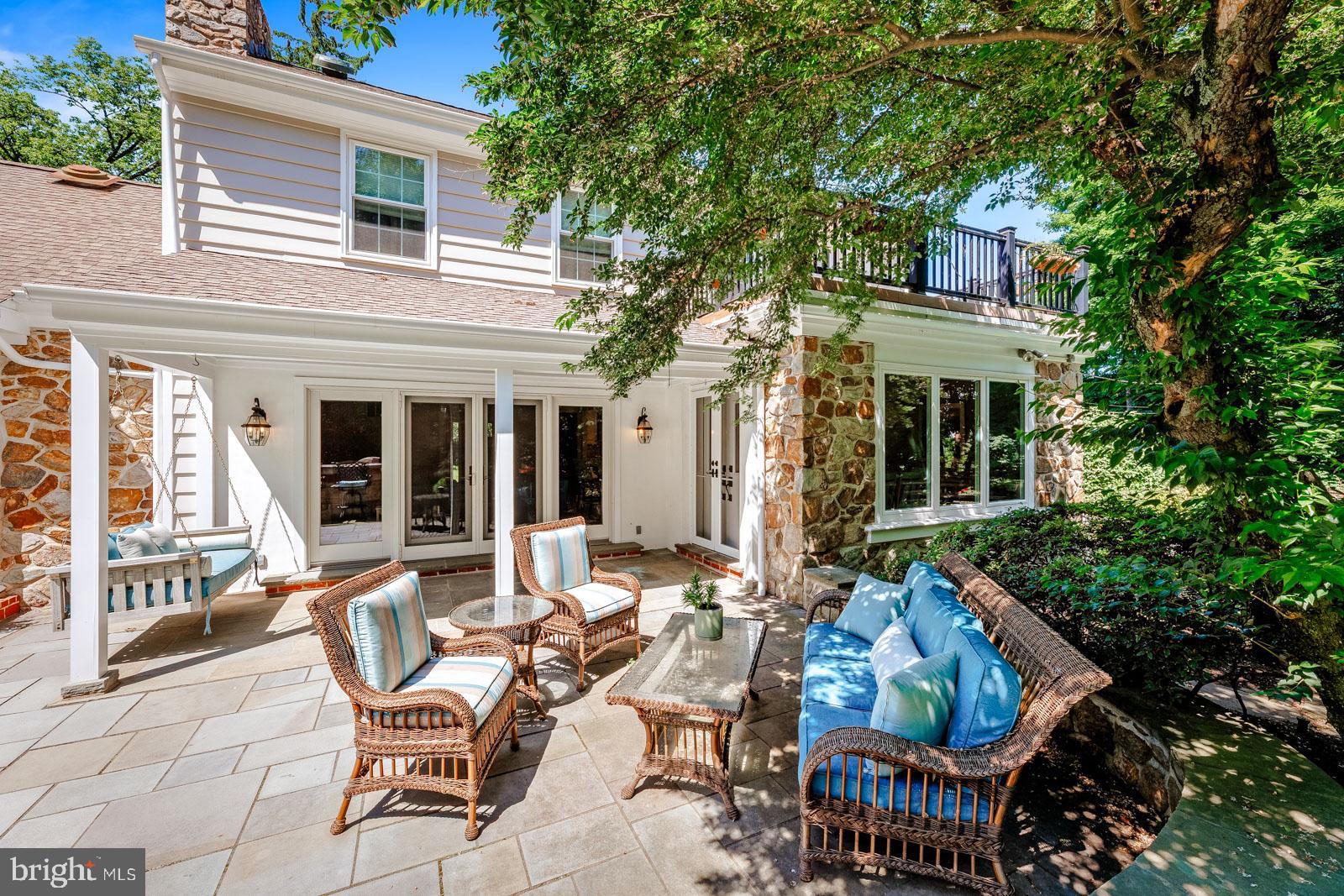 1700 Old Welsh Road Huntingdon Valley, PA 19006 - Photo 79 of 105 a view of a patio with couches table and chairs and potted plants