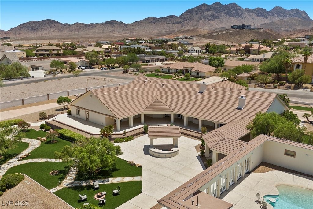 640 Quail Covey Road Henderson, NV 89002 - Photo 59 of 75 Aerial perspective of suburban area with a mountainous background