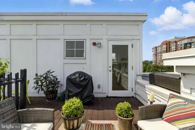 a view of a balcony with city view