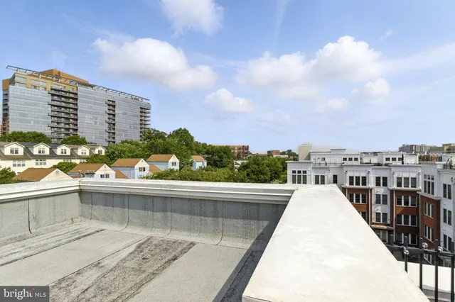 a view of parking garage with cars