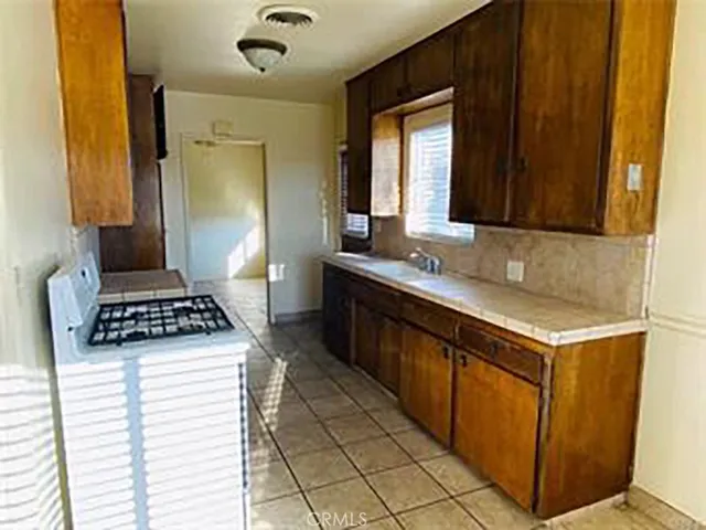 a bathroom with a sink and a shower