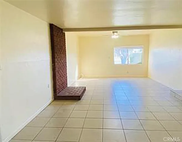 a view of a room with an empty space