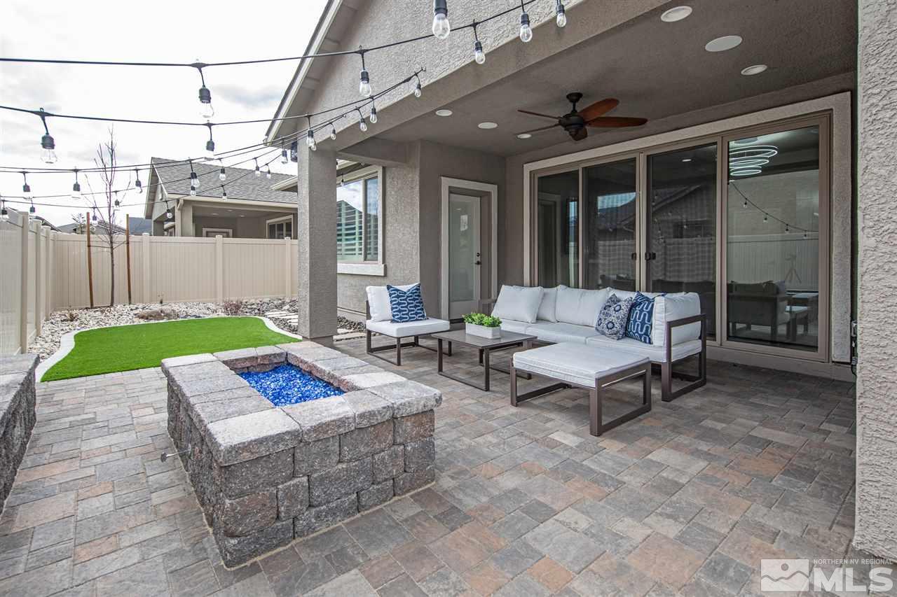 601 Riverbed Circle Reno, NV 89521 - Photo 12 of 31 a patio with patio couch and table