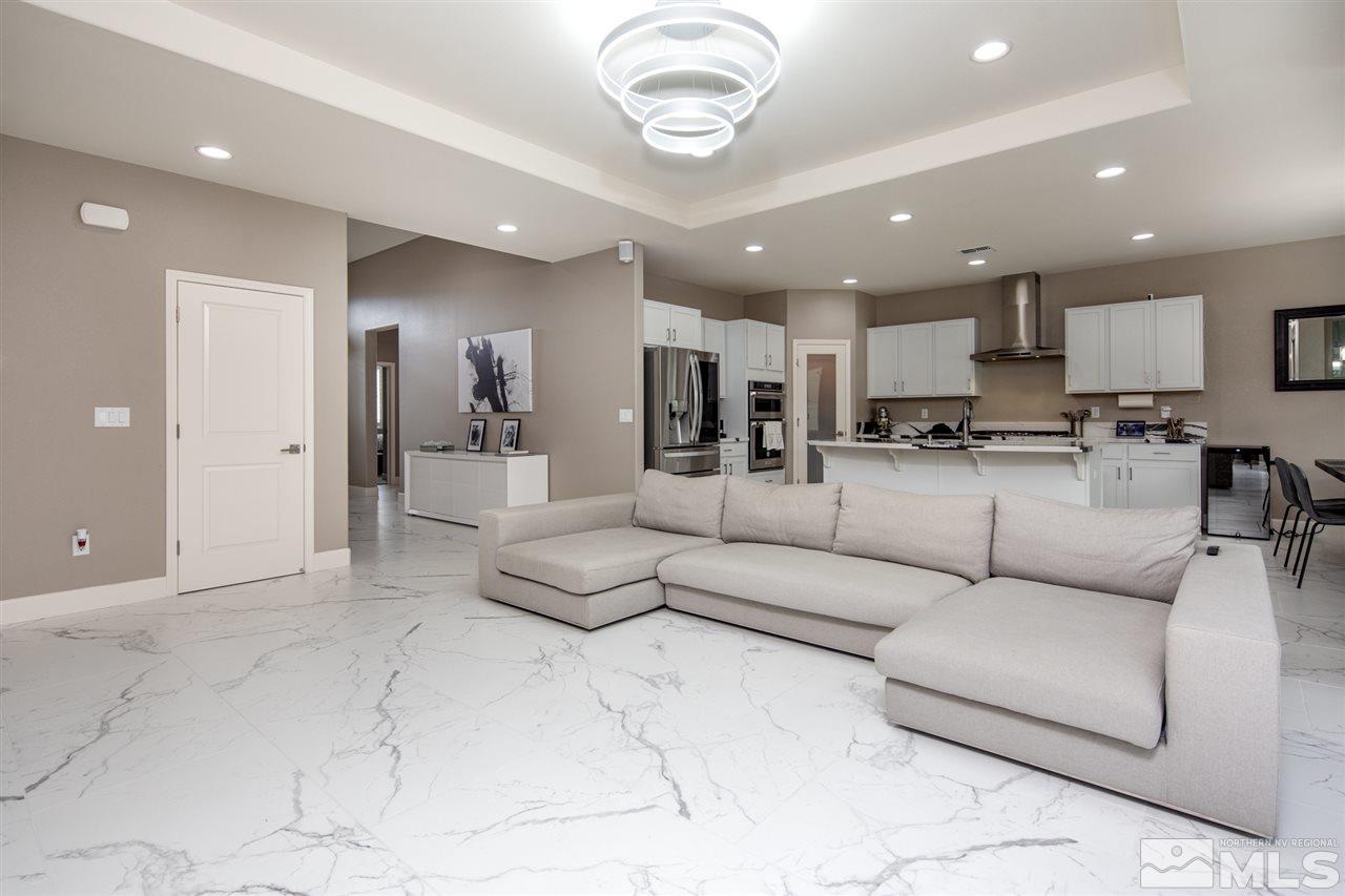 601 Riverbed Circle Reno, NV 89521 - Photo 24 of 31 a living room with furniture and a view of kitchen