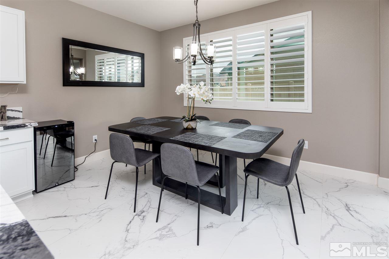 601 Riverbed Circle Reno, NV 89521 - Photo 10 of 31 a dining room with furniture and window