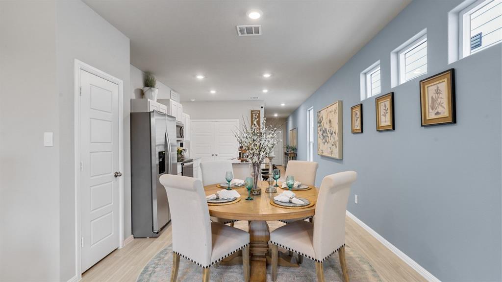 3053 Maple Orch Lane Fort Worth, TX 76140 - Photo 10 of 38 a view of a dining room with furniture