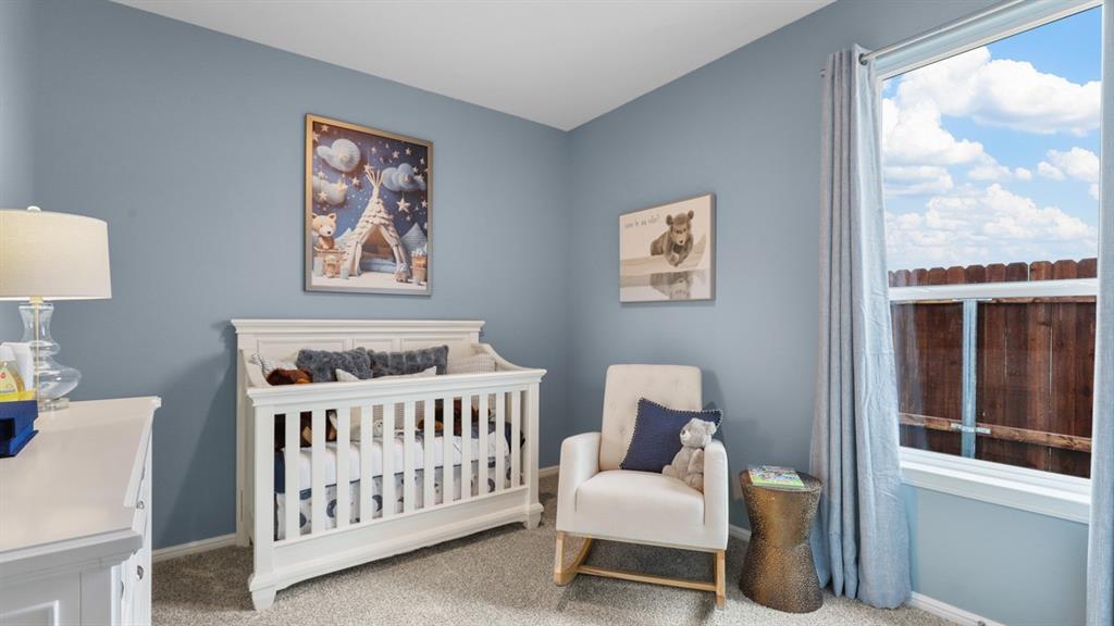 3053 Maple Orch Lane Fort Worth, TX 76140 - Photo 29 of 38 a bedroom with furniture and a window