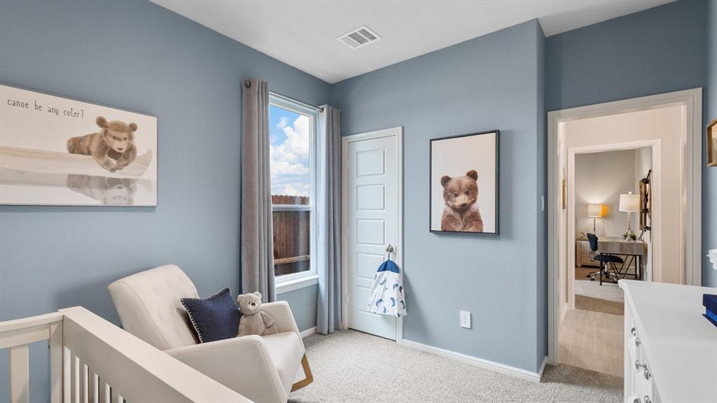 3053 Maple Orch Lane Fort Worth, TX 76140 - Photo 30 of 38 a living room with furniture and wall paintings
