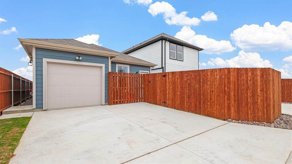 3053 Maple Orch Lane Fort Worth, TX 76140 - Photo 34 of 38 a view of backyard with cabin