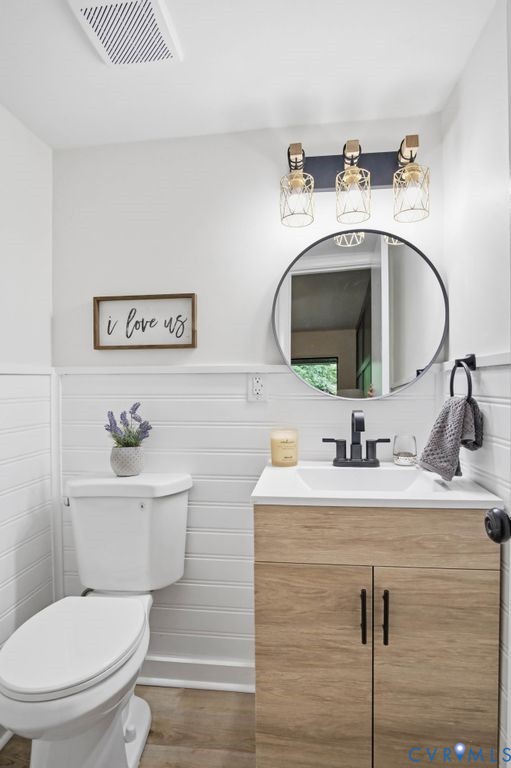 10270 Iron Mill Road Richmond, VA 23235 - Photo 22 of 29 Bathroom featuring a wood-finish vanity with an in