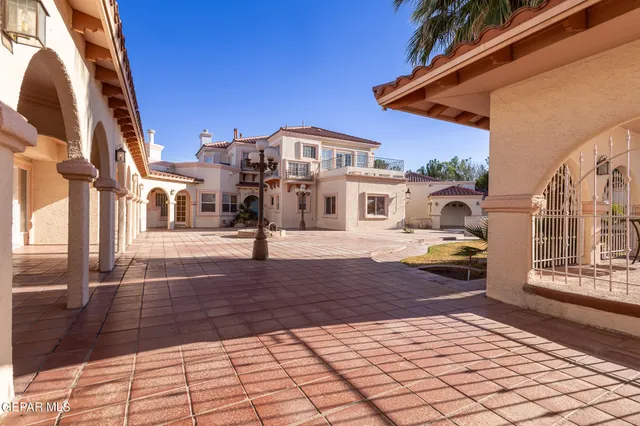 a view of an entryway with a floor to ceiling windows