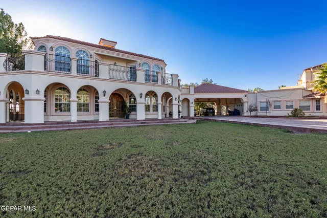 a view of a street with a building in the background