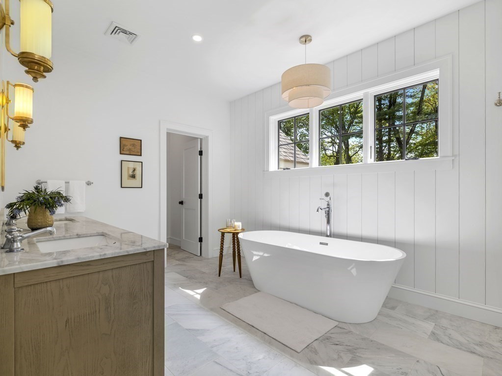 23 Alpine Road Wayland, MA 01778 - Photo 11 of 25 a view of a bathtub in a bathroom