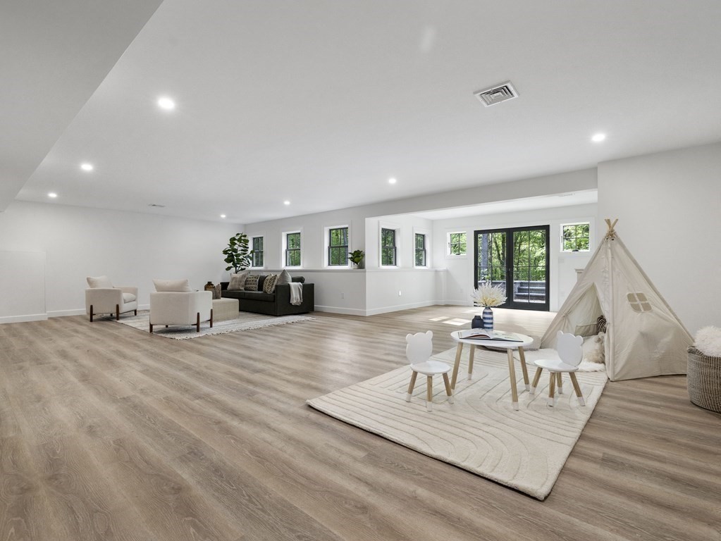 23 Alpine Road Wayland, MA 01778 - Photo 19 of 25 a living room with furniture and a wooden floor