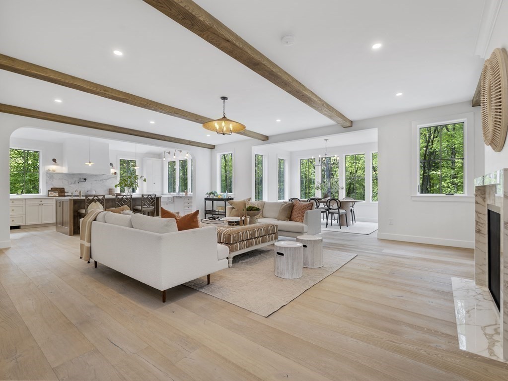 23 Alpine Road Wayland, MA 01778 - Photo 22 of 25 a living room with fireplace furniture and a large window