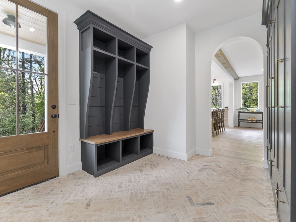 23 Alpine Road Wayland, MA 01778 - Photo 8 of 25 a view of an empty room with furniture and a window