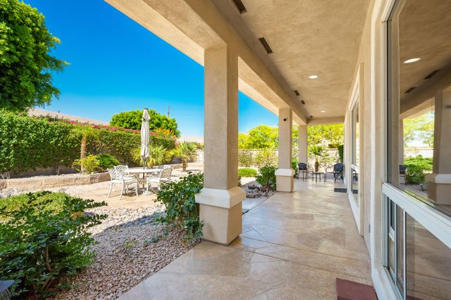 a lobby with furniture and garden