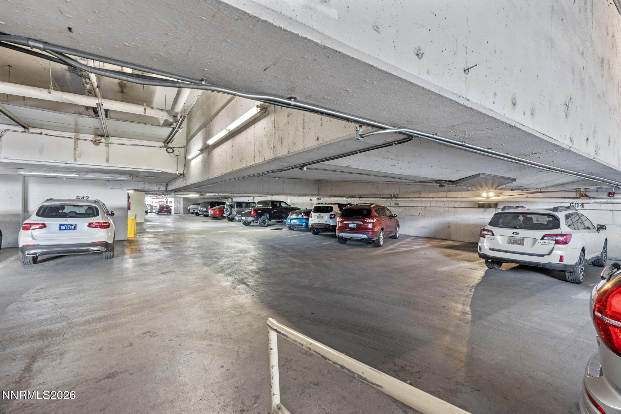 100 North Arlington Avenue, Unit 22G Reno, NV 89501 - Photo 34 of 37 a view of cars parked in a parking