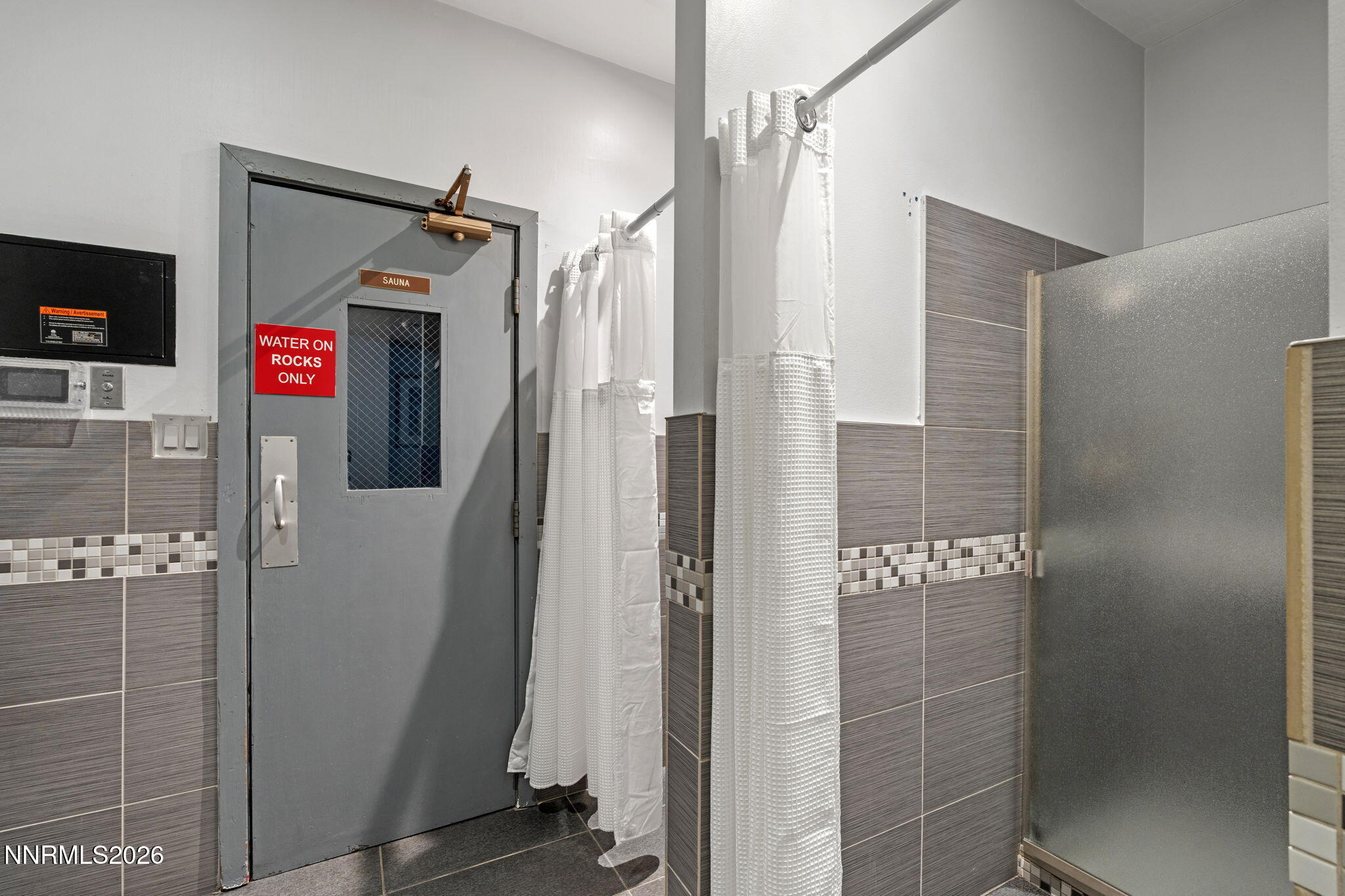100 North Arlington Avenue, Unit 22G Reno, NV 89501 - Photo 36 of 37 a bathroom with a shower