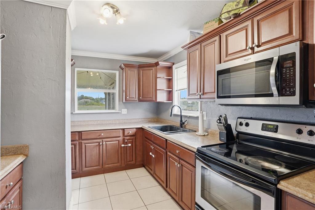 4302 7th Street Southwest Lehigh Acres, FL 33976 - Photo 3 of 32