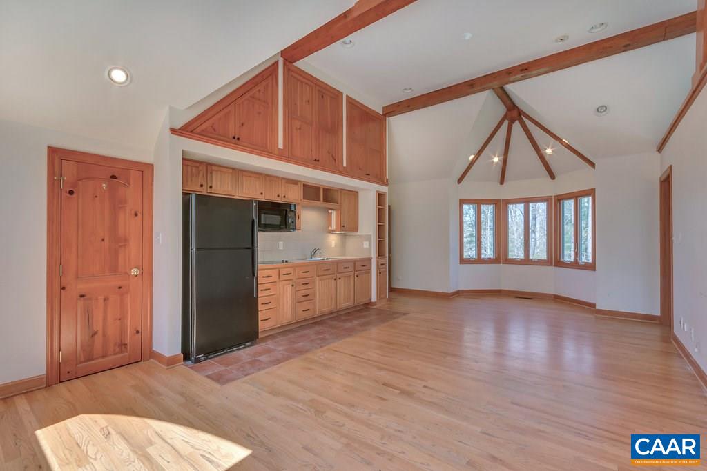 3700 Millington Road Free Union, VA 22940 - Photo 27 of 41 an empty room with wooden floor and windows
