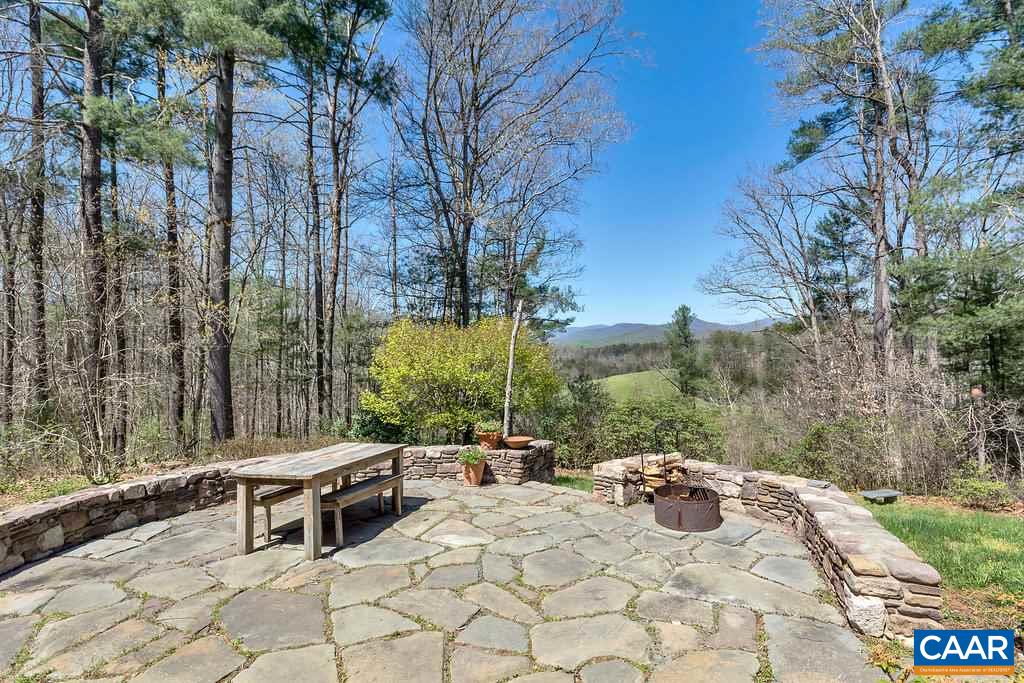 3700 Millington Road Free Union, VA 22940 - Photo 32 of 41 a view of a terrace with chairs and a fire pit