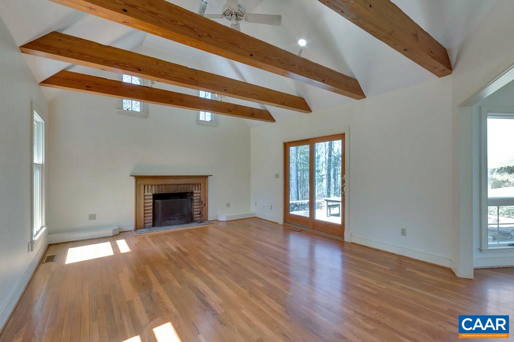 3700 Millington Road Free Union, VA 22940 - Photo 4 of 41 a view of an empty room with wooden floor and a window