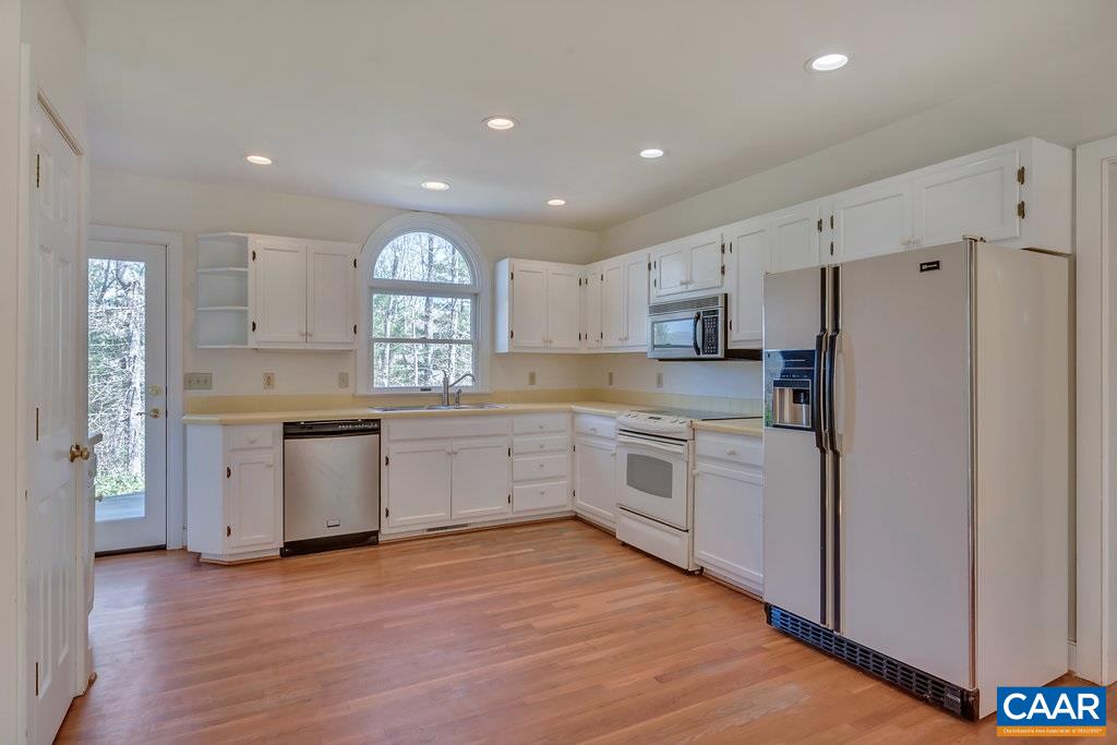 3700 Millington Road Free Union, VA 22940 - Photo 8 of 41 a open kitchen with granite countertop a refrigerator stove top oven and sink