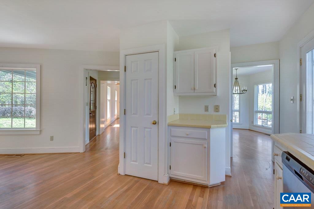 3700 Millington Road Free Union, VA 22940 - Photo 9 of 41 an empty room with wooden floor and windows