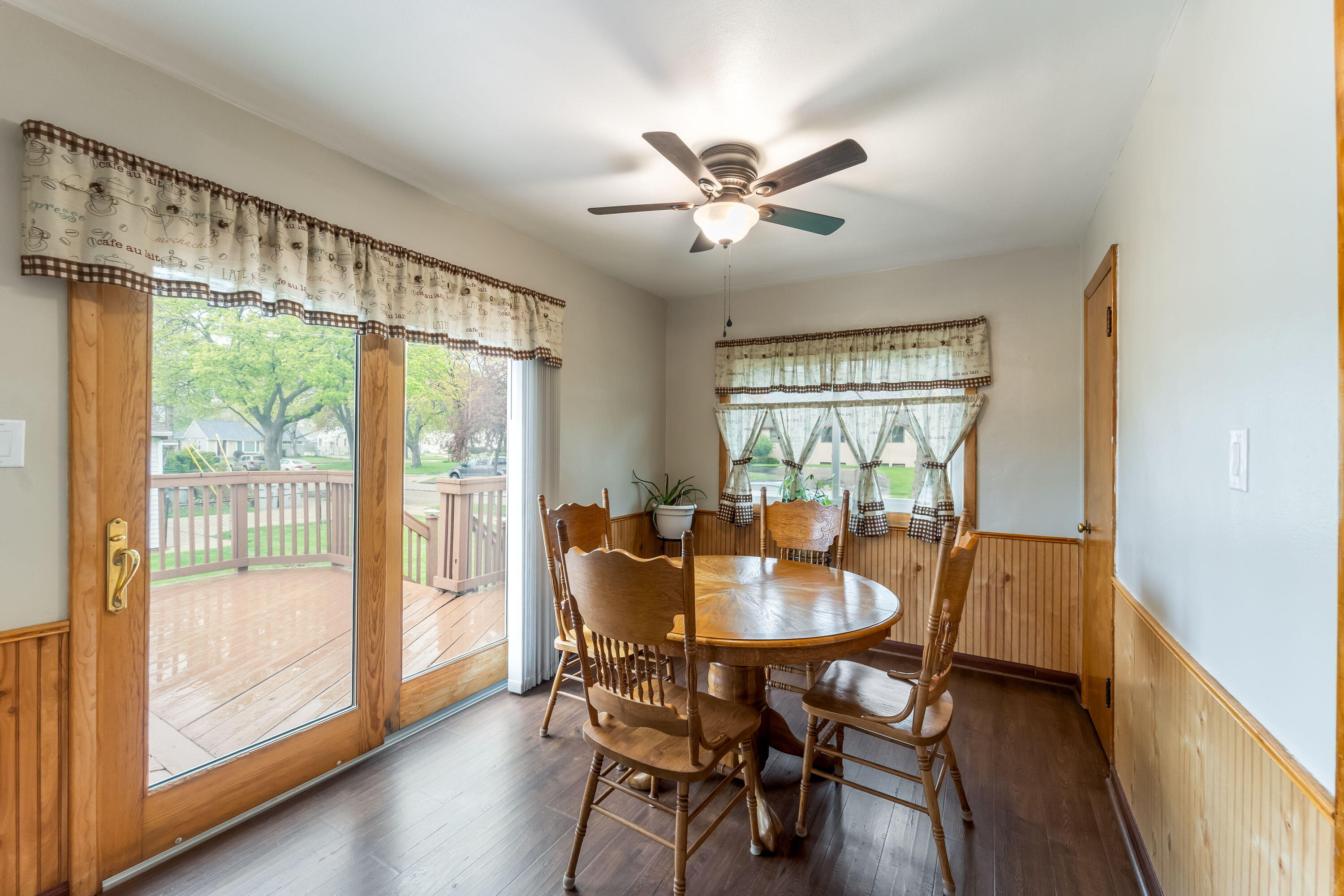 3603 South 23rd Street Milwaukee, WI 53221 - Photo 7 of 23 The bright dining area features patio doors leading to the deck and the spacious fenced in backyard.