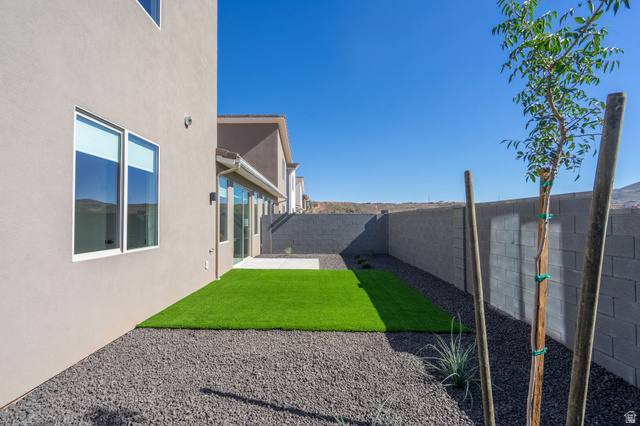 2972 West 570 North Hurricane, UT 84737 - Photo 85 of 104 Fenced backyard featuring a patio area
