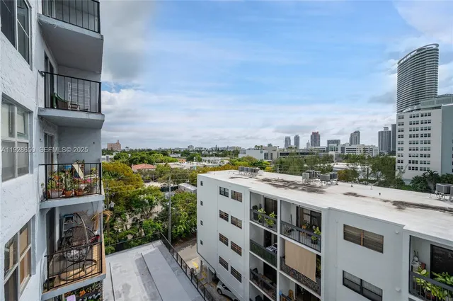 a view of a city with tall buildings