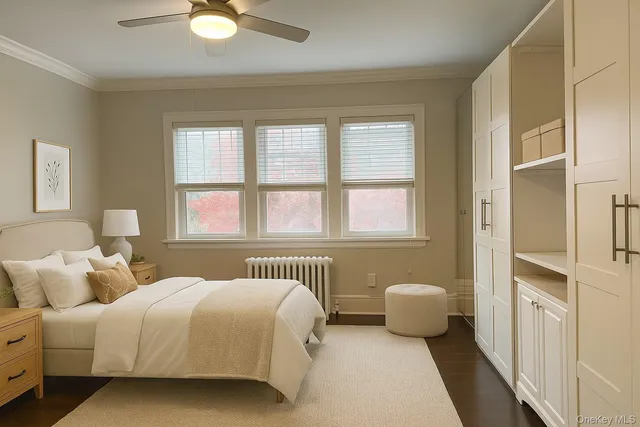 a bathroom with a double vanity sink mirror and toilet