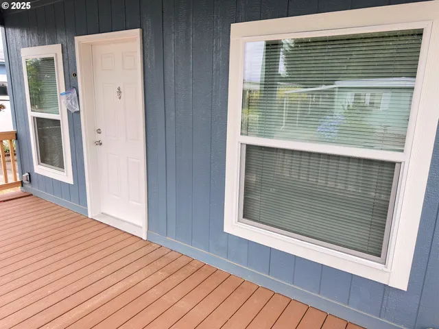 a view of a balcony with a door
