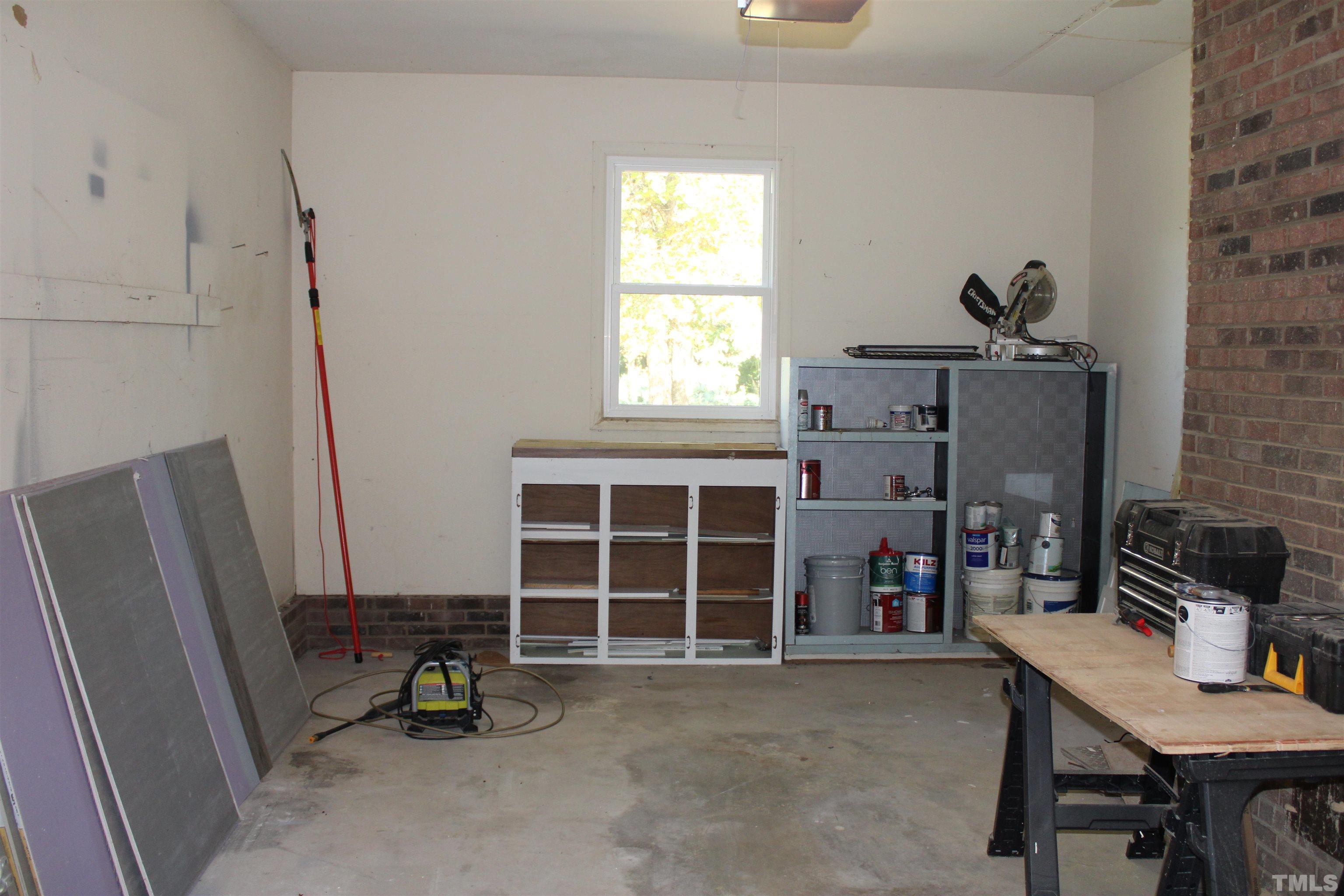9300 Sauls Road Raleigh, NC 27603 - Photo 14 of 17 a living room with furniture and a window