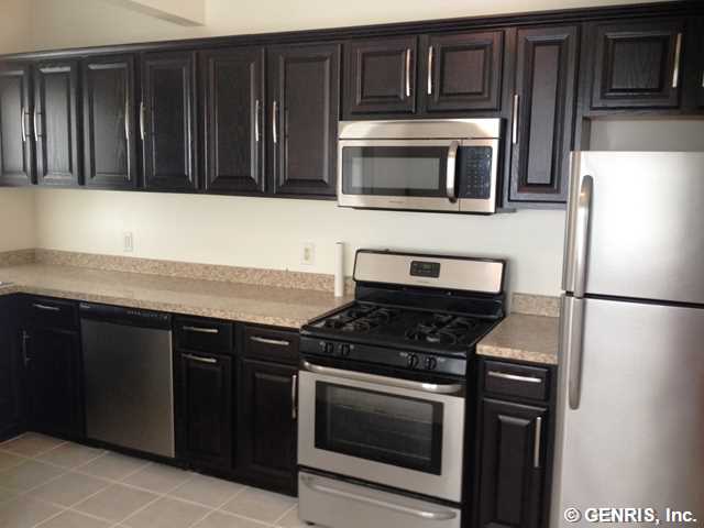 426 Magnolia Street Rochester, NY 14611 - Photo 2 of 12 Kitchen. Totally new kitchen with tile floor.
