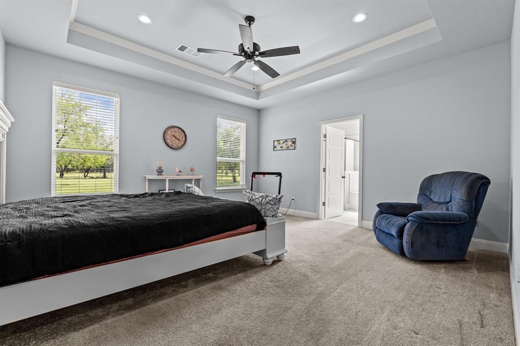 560 Wilson Bend Road Millsap, TX 76066 - Photo 21 of 38 Trayed ceilings and great natural light.