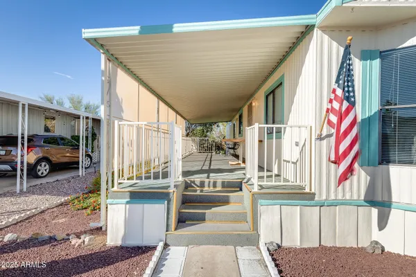 a view of a house with a street
