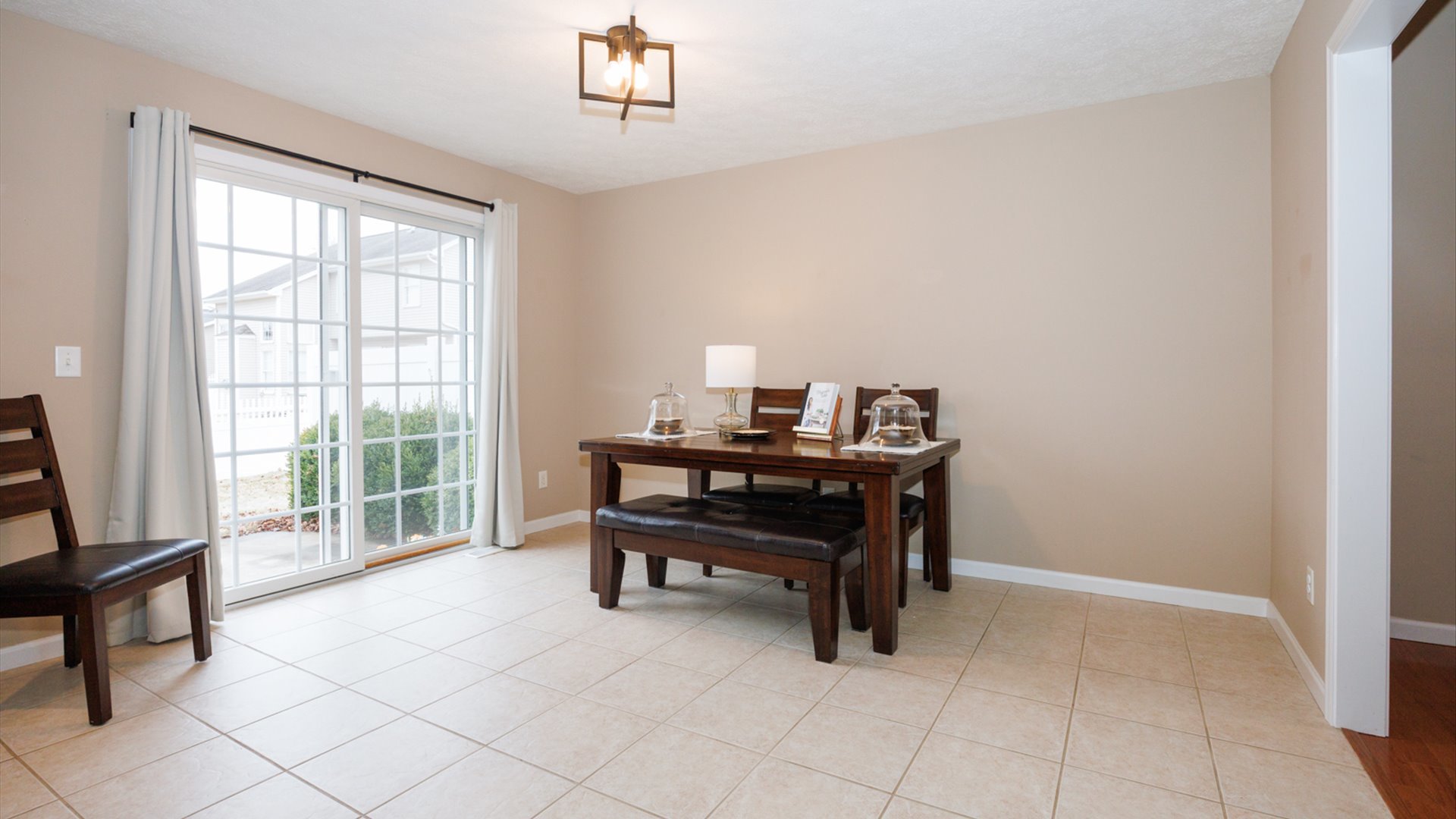 1170 Lynx Lane Normal, IL 61761 - Photo 11 of 46 a view of a workspace with furniture and a window