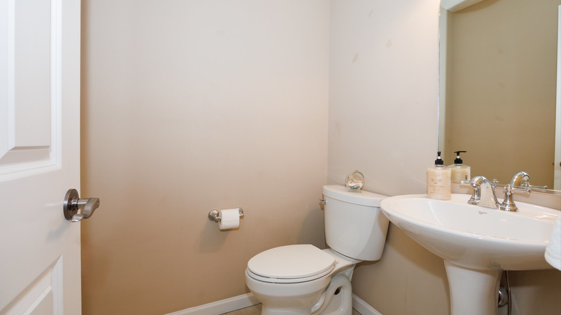 1170 Lynx Lane Normal, IL 61761 - Photo 19 of 46 a bathroom with a sink and a toilet