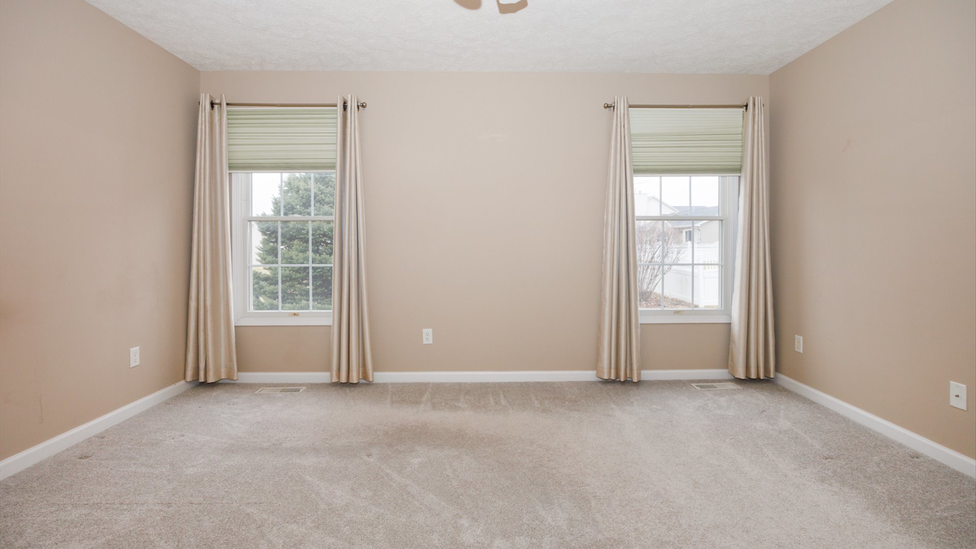 1170 Lynx Lane Normal, IL 61761 - Photo 21 of 46 an empty room with windows and closet