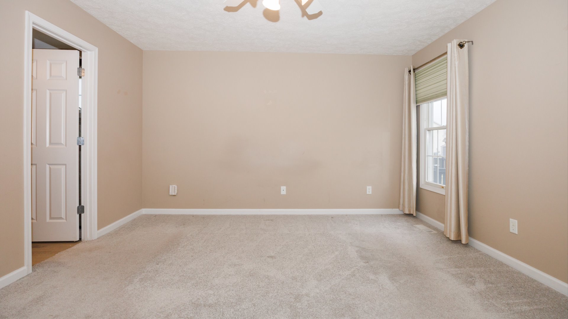 1170 Lynx Lane Normal, IL 61761 - Photo 23 of 46 an empty room with windows and closet